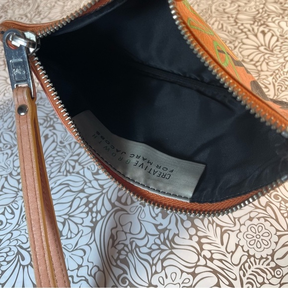 Creative Royalty for Marc Jacobs Orange wristlet - Picture 7 of 9